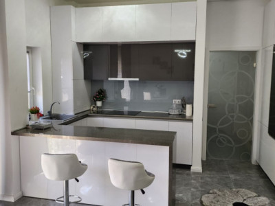 Apartament de 2 camere, ultrafinisat, 62 mp, gradina de 75 mp zona Terra